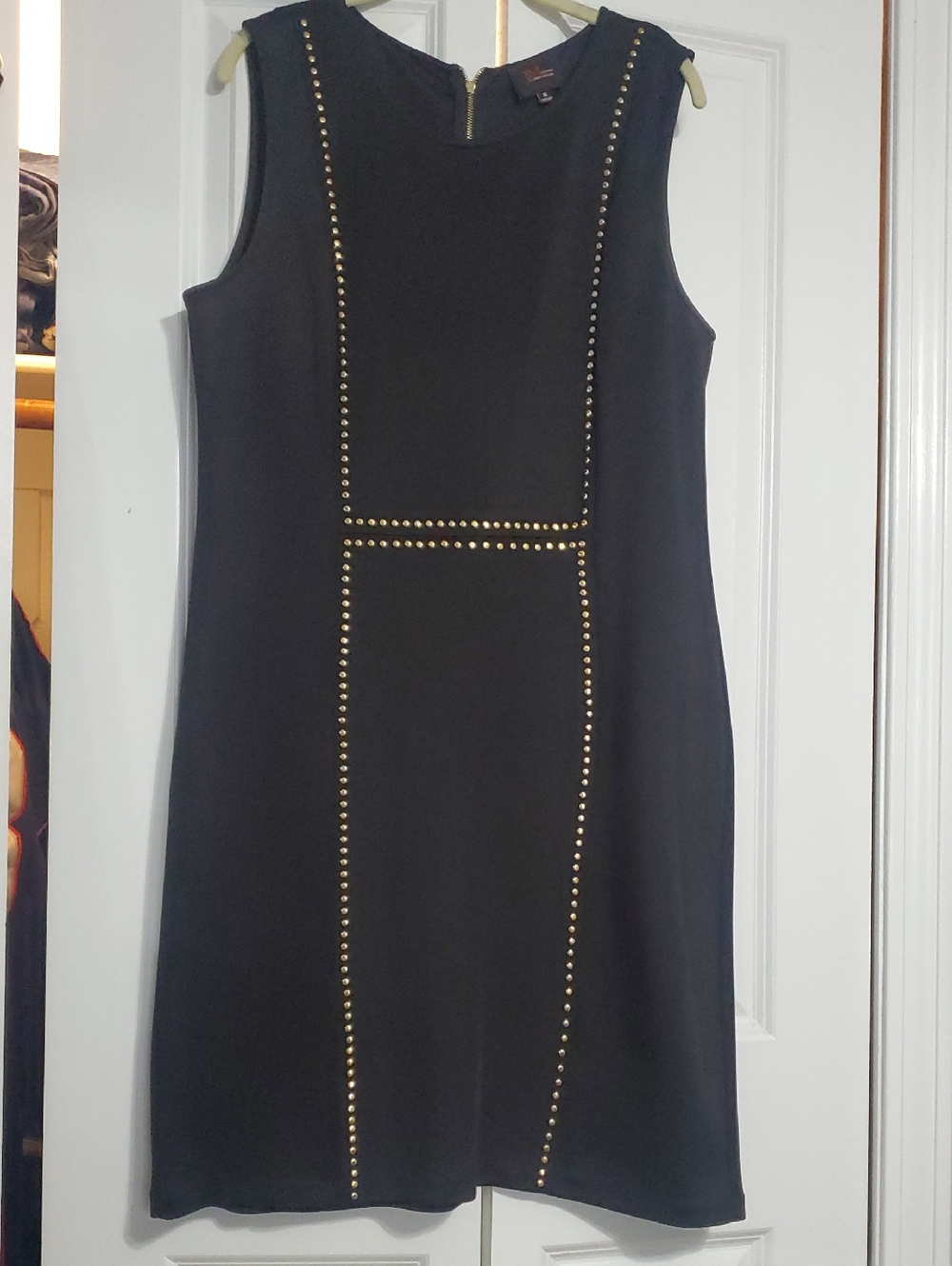 Classic Black Sleeveless Dress with Gold Stud Trim
